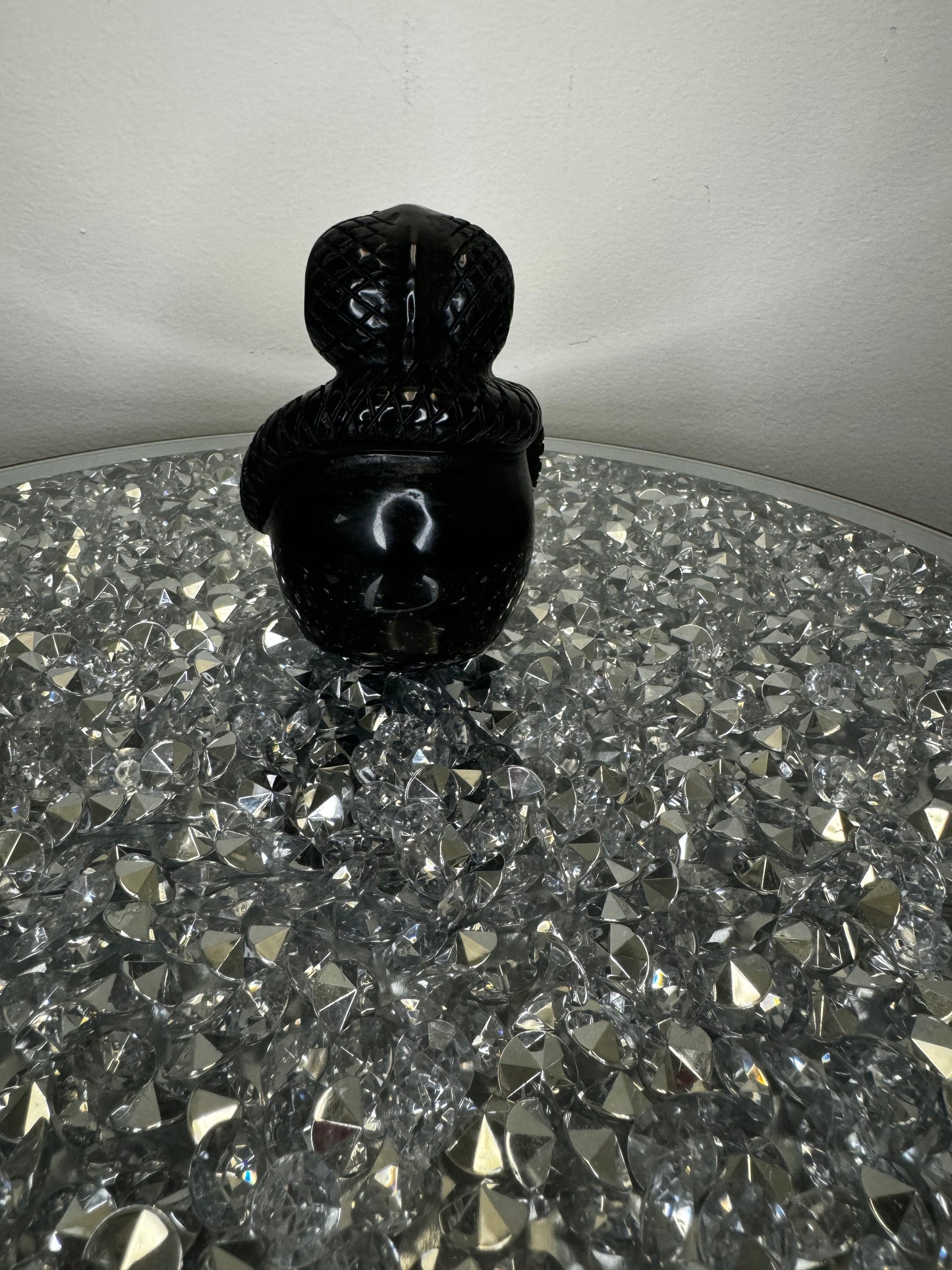 Black obsidian skull with cobra