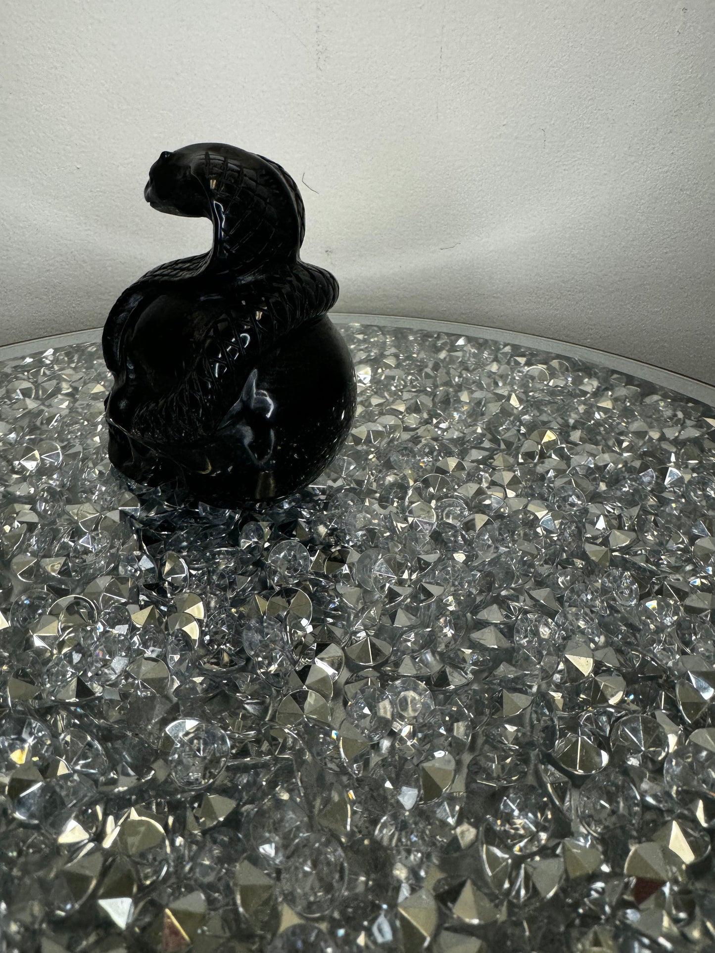 Black obsidian skull with cobra