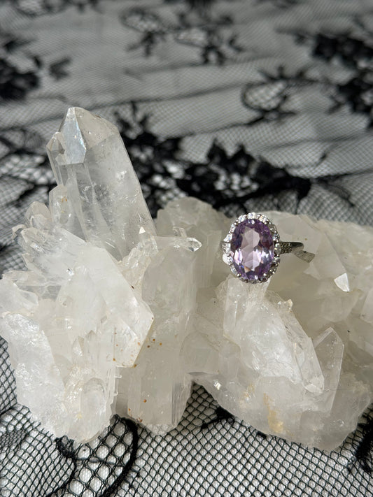925 sterling silver with purple amethyst stone adjustable size