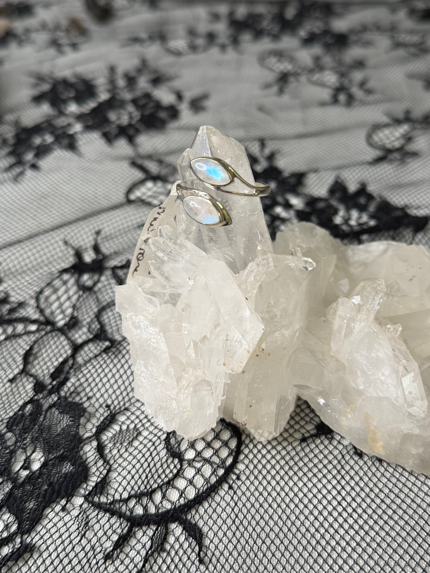 925 sterling silver with moonstone stone size 10 but slightly adjustable