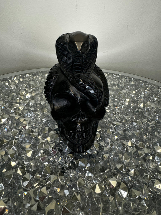 Black obsidian skull with cobra